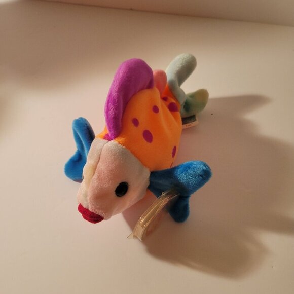 Ty Beanie Babies Lips Other - "Lips" the Fish is a colorful Ty Beanie Baby, released in 1999. Its vibrant oran